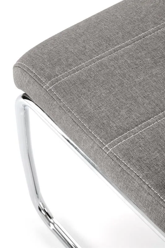 Krzesło tapicerowane K349 szare z uchwytem na srebrnej płozie | MIRAT.