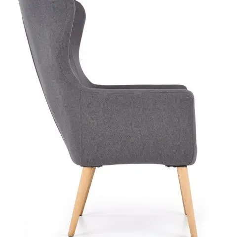 Luksusowy tapicerowany fotel uszak pikowany z wysokim oparciem i szerokim siedziskiem oraz podłokietnikami na drewnianych nogach kolor szary Cotto