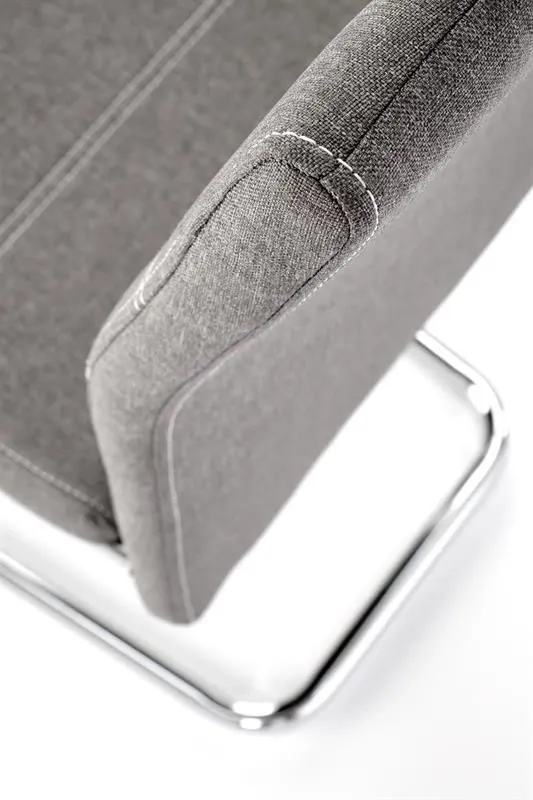 Krzesło tapicerowane K349 szare z uchwytem na srebrnej płozie | MIRAT.