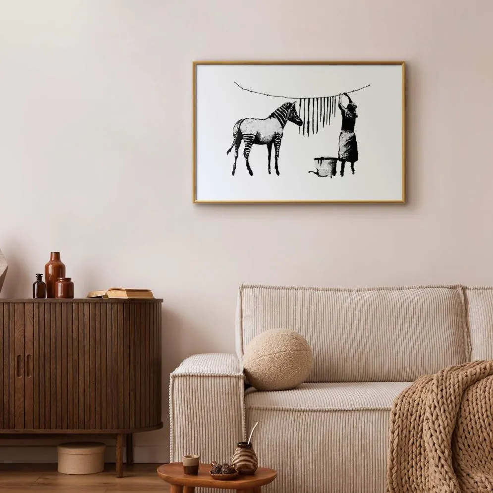 Plakat Banksy: Pranie 42x29,7 cm z ramą złotą z marginesem | MIRAT.