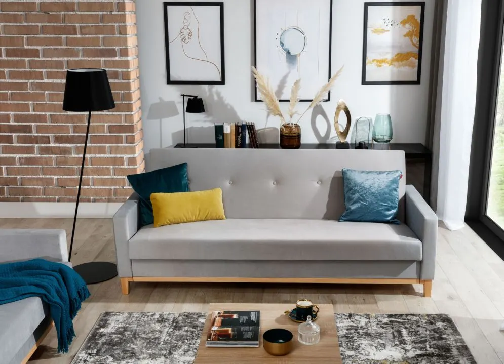 Sofa rozkładana z funkcją spania SELENE szara na drewnianych nogach | MIRAT.