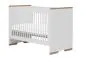 Białe niemowlęce łóżeczko polskiej produkcji ze stelażem SNAP