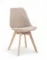 Beżowe krzesło tapicerowane tkaniną na drewnianych nogach K303